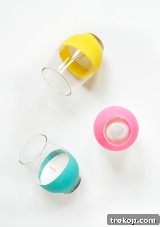 Craft Colorful Citronella Candles with a Balloon Dip Design 10 DIY BALLOON DIPPED CITRONELLA CANDLES - sugar and cloth