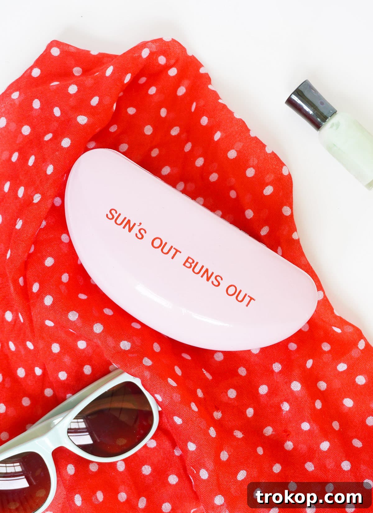 Customizable retro DIY sunglasses case with 'Sun's Out Buns Out' pun on a vibrant background.