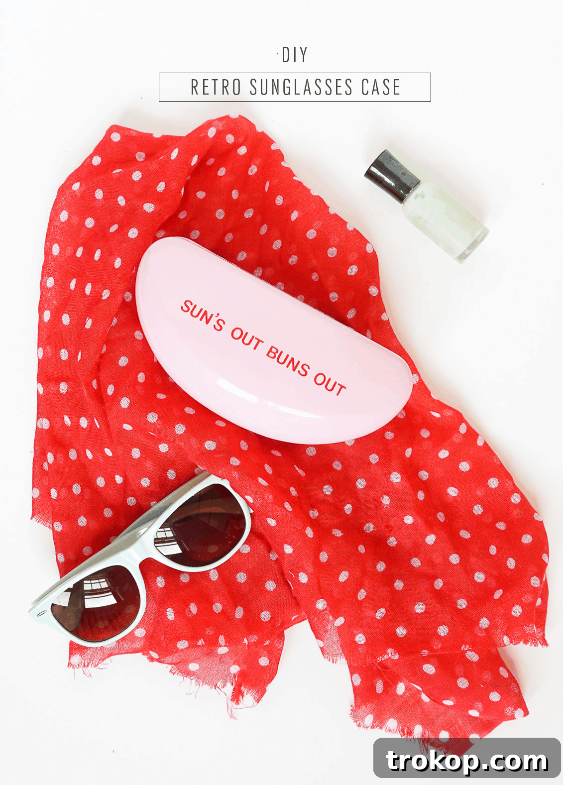 Stylishly arranged retro sunglasses cases with custom puns on a bright, summery background.
