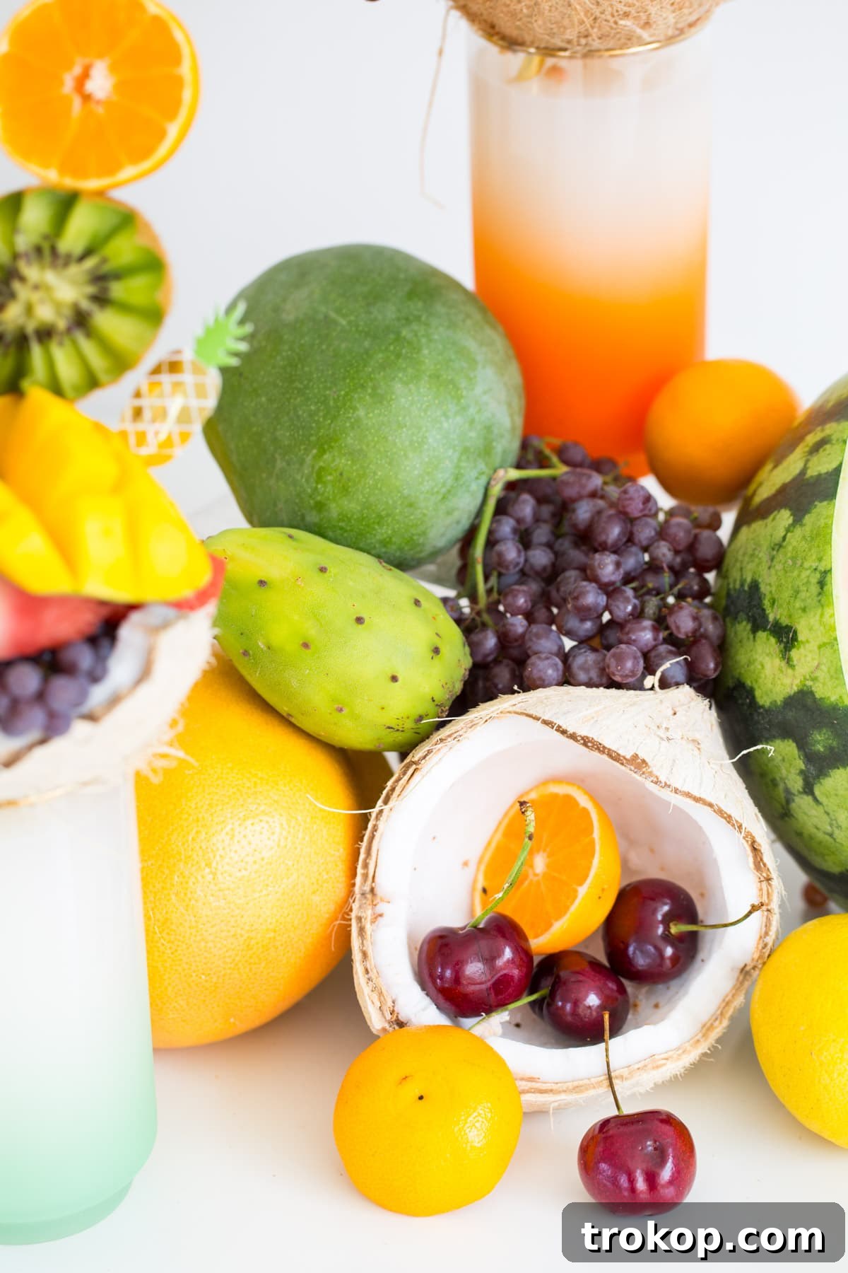 Collection of fresh fruits and tools for making freakshakes