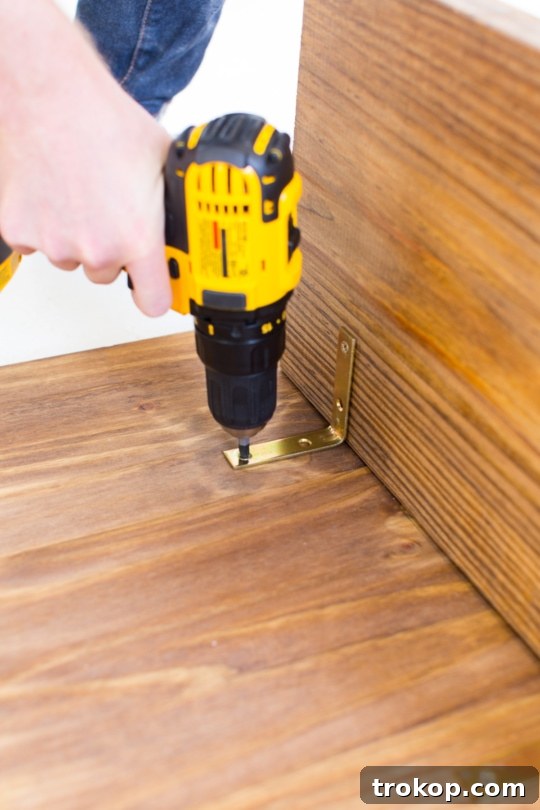 Step 7 - DIY Low Floor Table Tutorial, attaching brackets