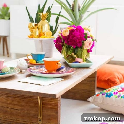 photo of a styled and set dining table with floor seating ideas