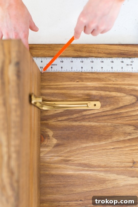 Step 3 - DIY Low Floor Table Tutorial, spray painting brackets