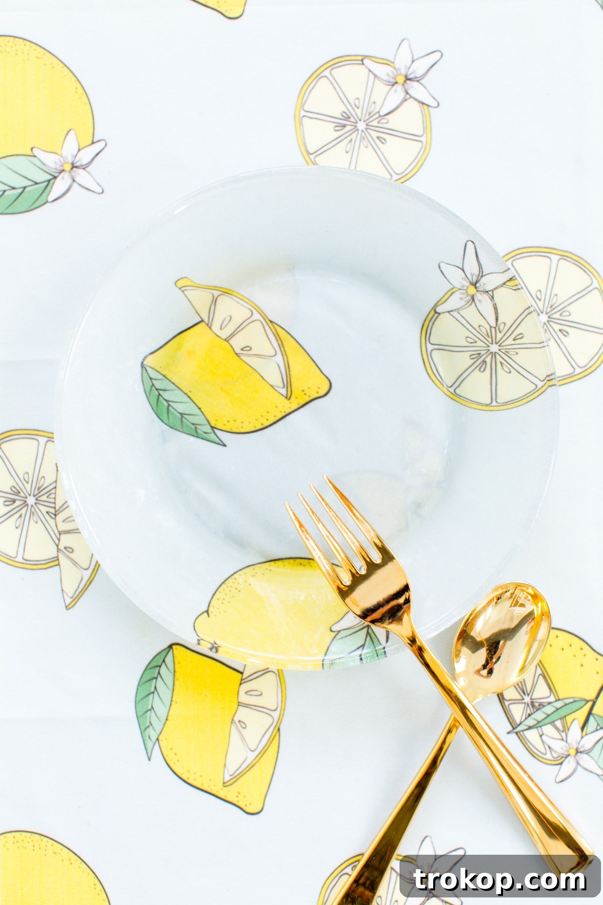 DIY Printed Plates and Peachy-Tini Cocktail 11 Close-up of a DIY printed plate with a lemon pattern, showing the crisp details of the fabric under the glass