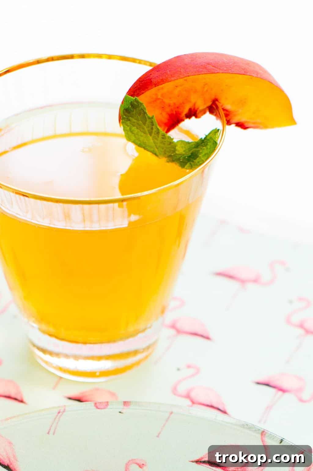 DIY Printed Plates and Peachy-Tini Cocktail 10 A beautifully arranged table setting with the DIY printed plates, a Peachy-Tini cocktail, and fresh peaches, perfect for entertaining