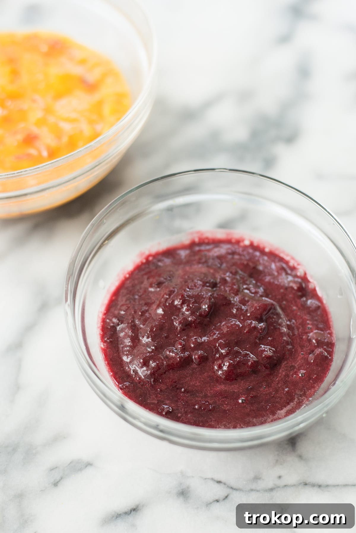 An array of Roasted Peach and Cherry Popsicles, showcasing their refreshing appeal and perfect for a hot day