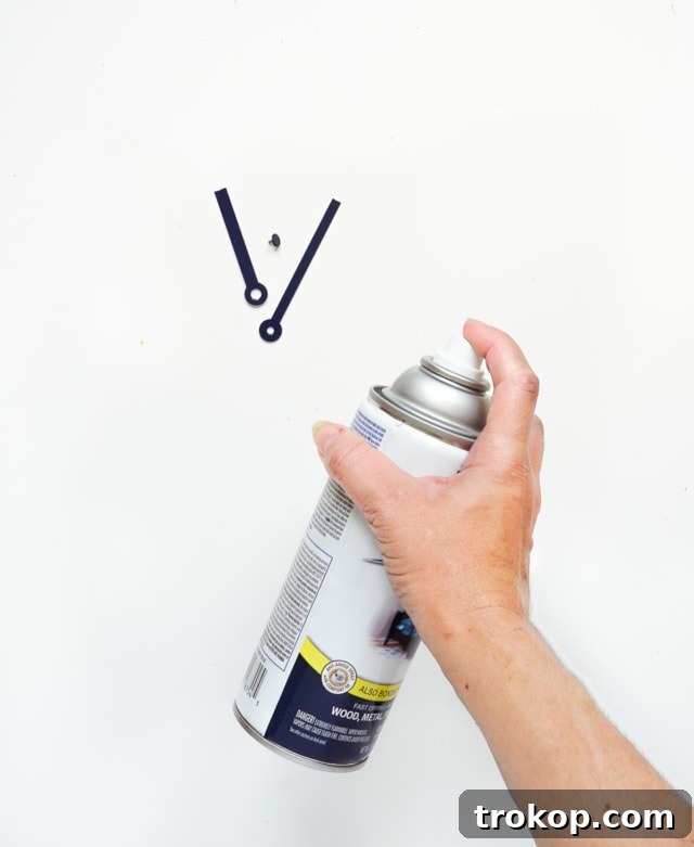Spray painting clock hands for custom DIY plate clock