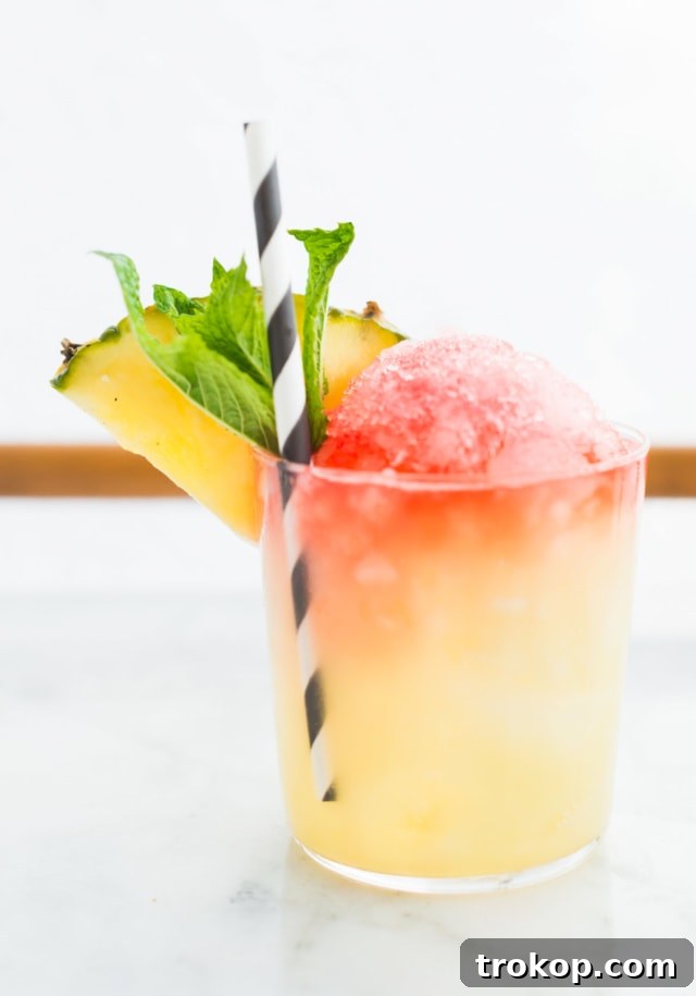 Pina Colada Shaved Ice Paradise 8 Tropical Frozen Boozy Drink Idea - Sugar & Cloth - Houston Blogger - Cocktail Recipe