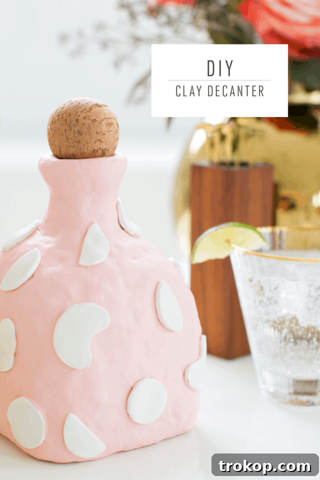 A collection of handmade clay decanters and decorative items, showcasing various designs, textures, and finishes, inspiring further clay crafting.