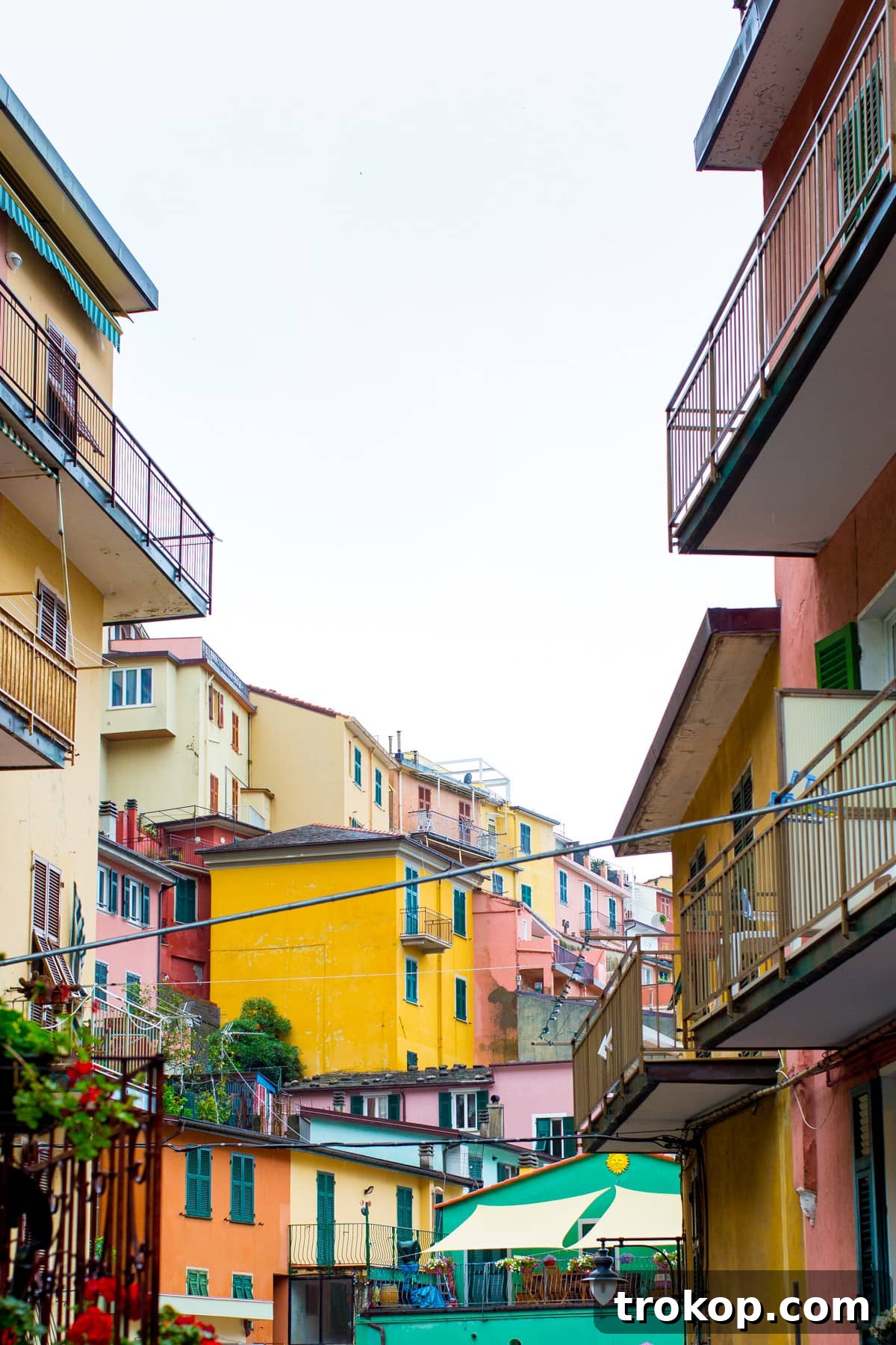 Mediterranean Escapade, Part 2: Aix, Portofino, Cinque Terre, Rome 25 The iconic colorful houses of Cinque Terre, Italy, even under a rainy sky, remain enchanting.