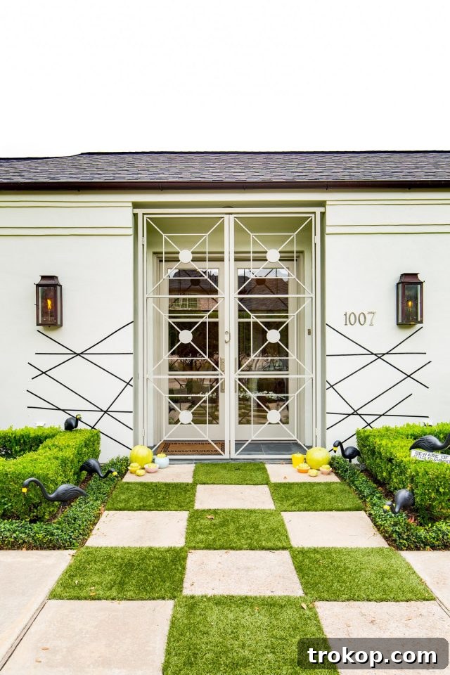 A perfectly spooky geometric entryway in a Palm Springs-inspired Halloween setting with mid-century elements.