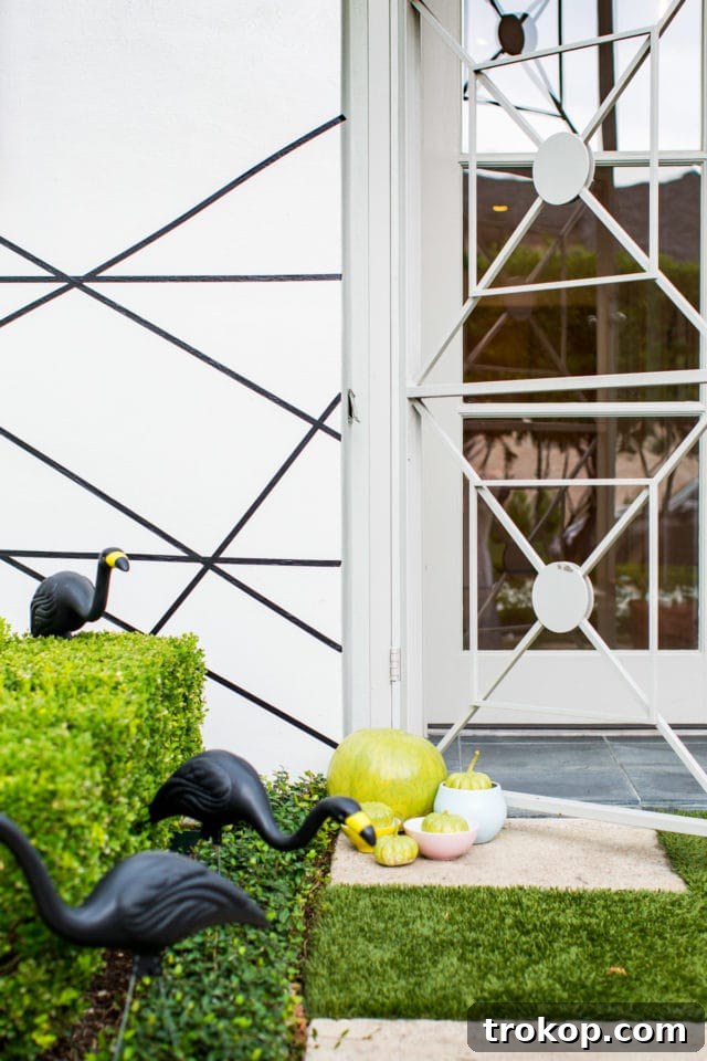 DIY a perfectly spooky geometric entry way using washi tape for a Palm Springs-inspired Halloween.