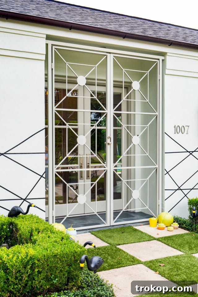 Mid-century design meets Halloween with elegant and spooky decor elements.