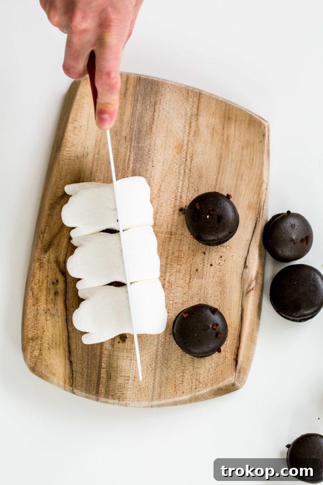 Halving Ghost Peeps for Dessert Toppers