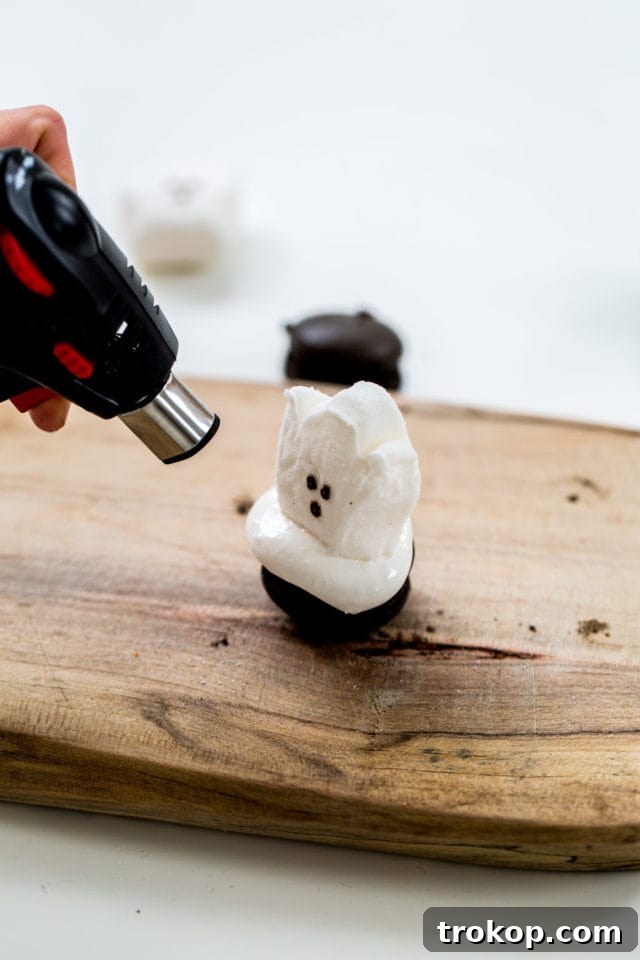Adding Toasted Marshmallow Ghost Peeps to Macarons