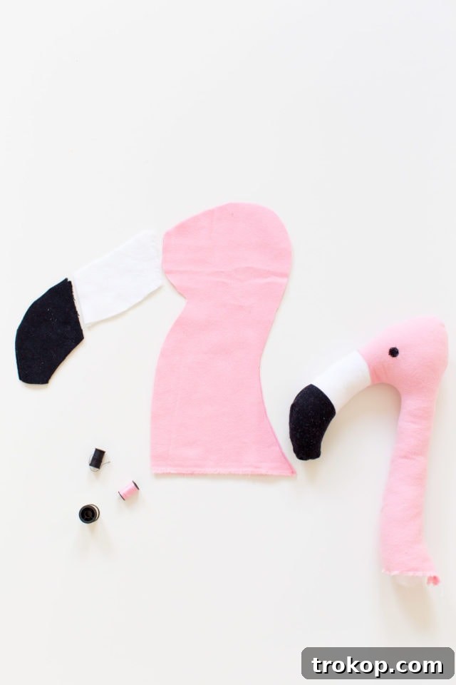 Step-by-step image of sewing flamingo beak for dog costume