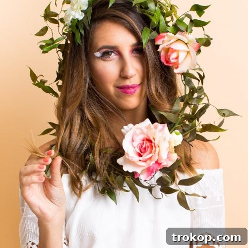 Craft Your Own Halloween Wigs and Lashes 27 photo of a girl looking at the camera in a floral crown halloween wig by sugar and cloth