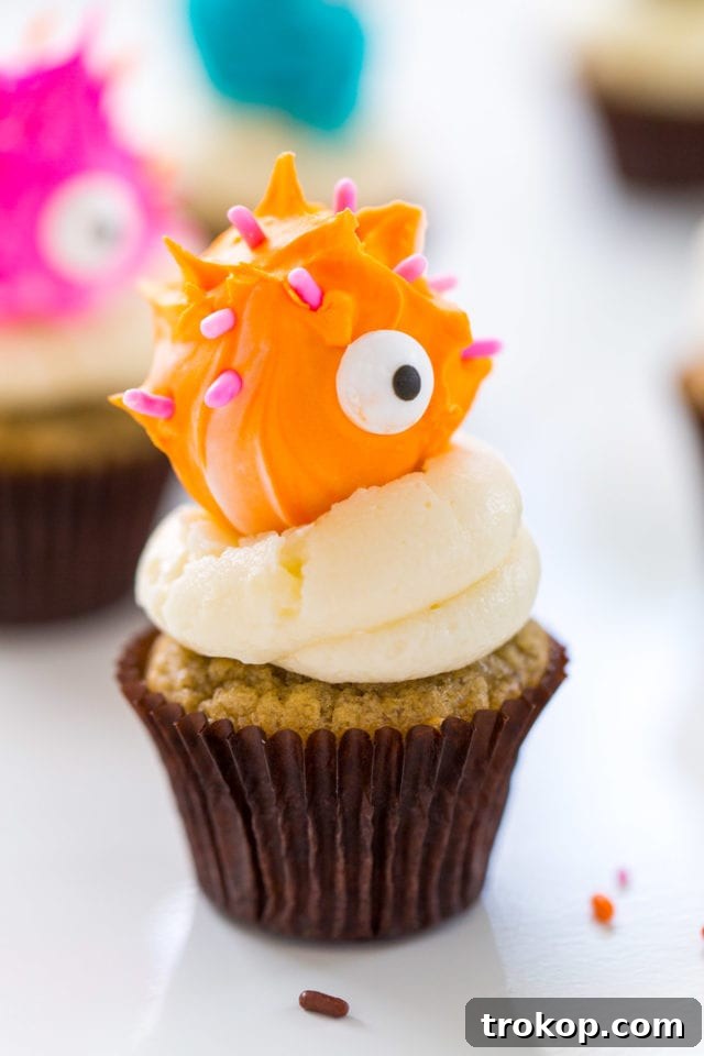 Adorable Truffle Monster Cake Toppers Recipe 10 A close-up of a DIY Truffle Monster Cupcake Topper showing intricate details