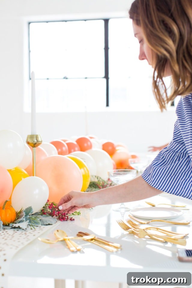 Close-up of a meticulously arranged balloon centerpiece with thoughtful color distribution