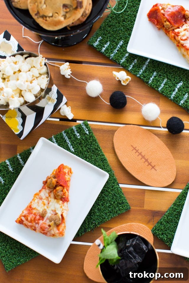 Kick Off Your Table with DIY Football Coasters and Mats 2 DIY Football Coasters and Placemats set up on a table for a game day party
