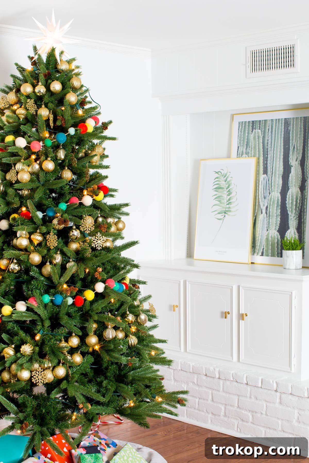 Unwrapping Our Holiday Living Room Makeover, Courtesy of Lowe's 10 After: The cozy corner with the velvet sofa and plush cushions, designed for comfort and relaxation.