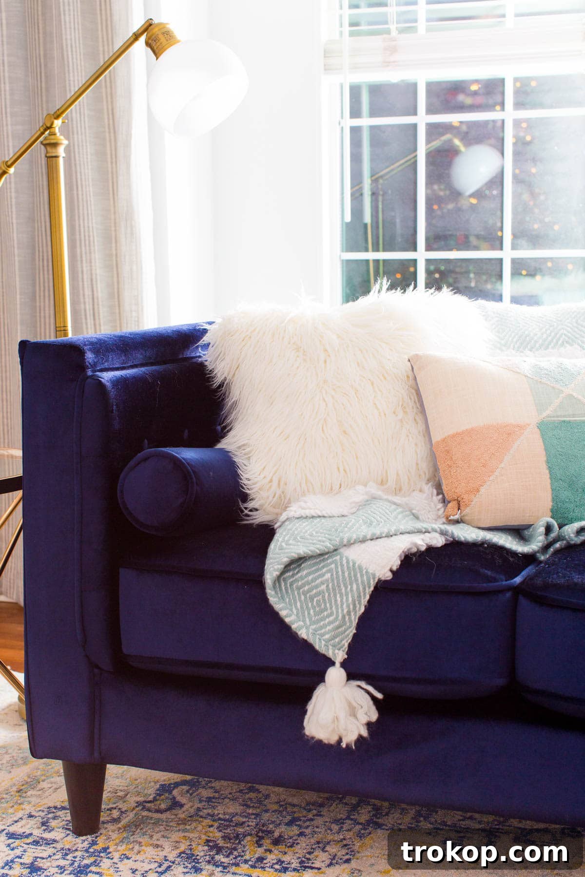 Unwrapping Our Holiday Living Room Makeover, Courtesy of Lowe's 13 After: Close-up of decor elements, including gold cabinet pulls, demonstrating how small details elevate the design.