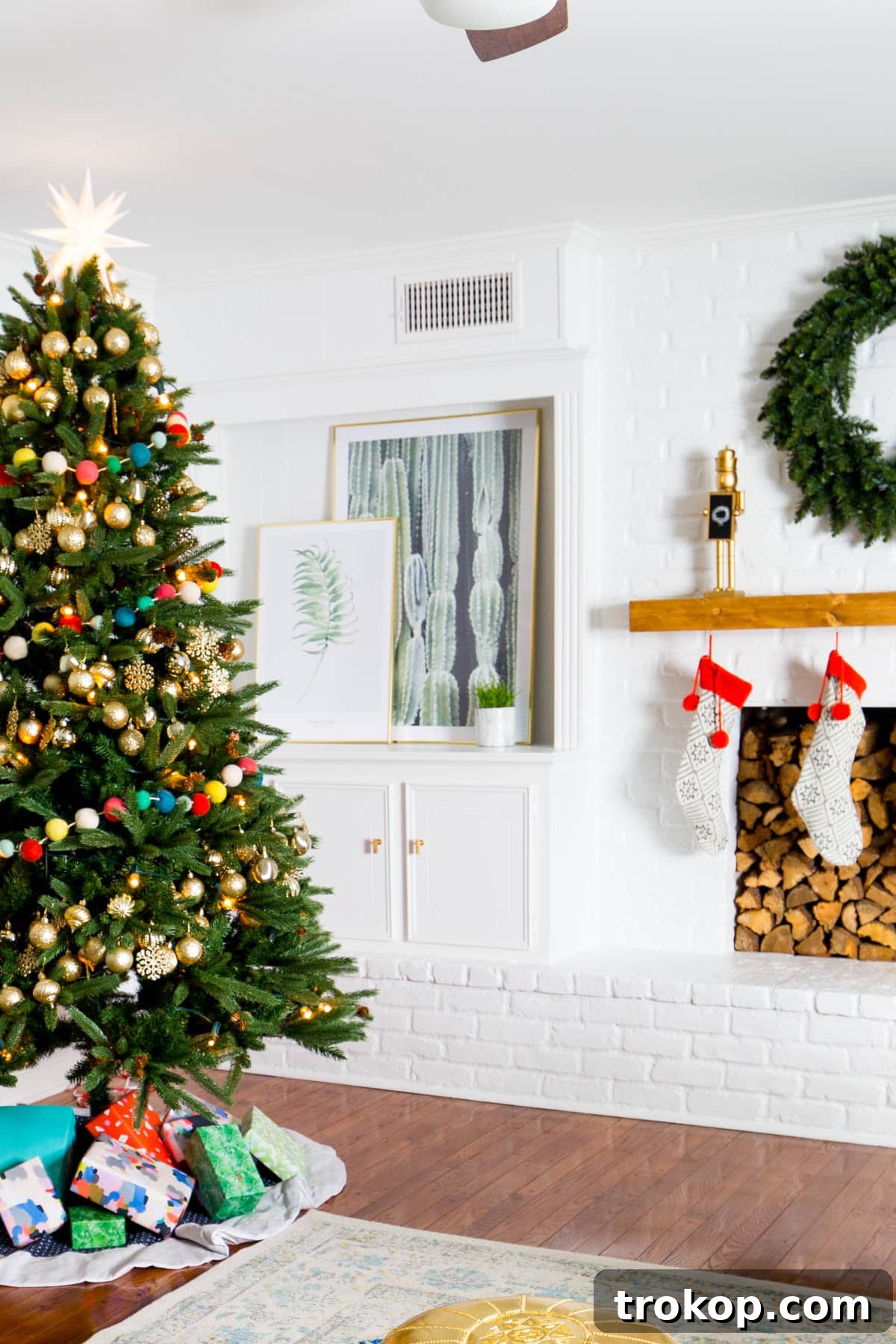 Unwrapping Our Holiday Living Room Makeover, Courtesy of Lowe's 3 Before: A different angle of the living room, highlighting existing furniture and wall colors before renovation.