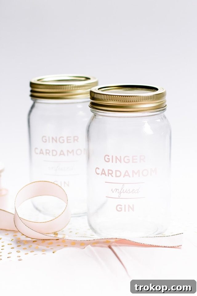 Three essential ingredients: gin, cardamom pods, and fresh ginger, ready to be combined for the infusion. A simple yet powerful trio for a unique holiday drink.