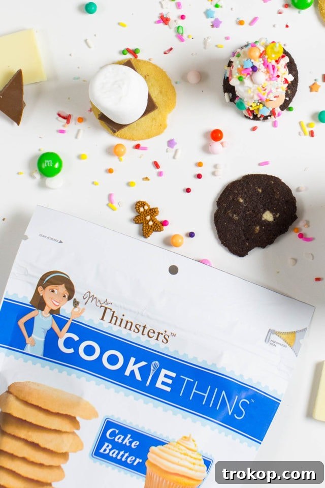 Finishing touch for Holiday Cookie and Sprinkle S'mores: Adding colorful sprinkles