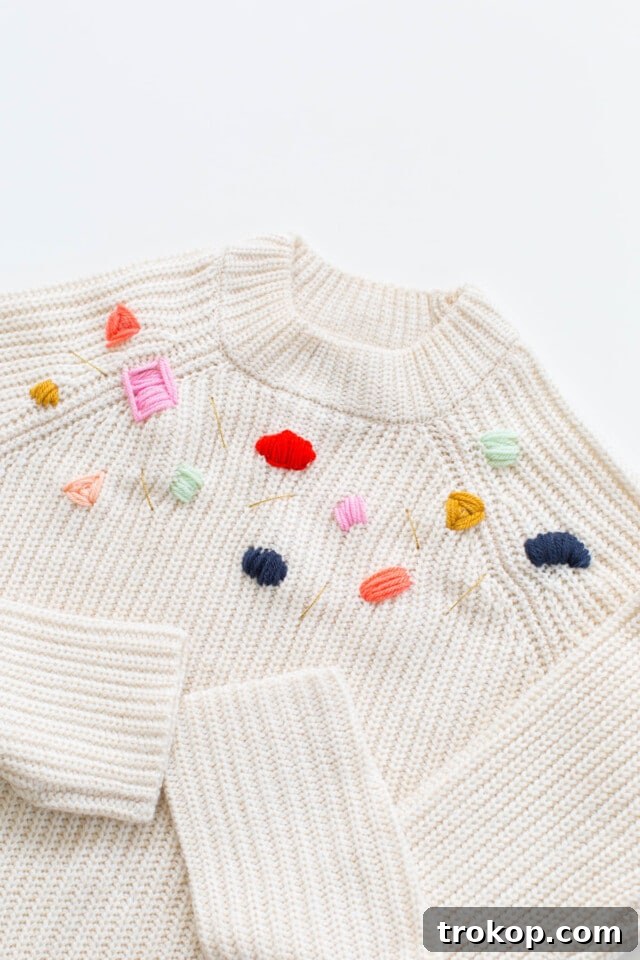 Custom Abstract Embroidery Pullover 11 Full view of the DIY abstract embroidered sweater being modeled, showcasing the overall effect of the colorful stitches on the garment, and its potential as a fashionable and personal accessory.