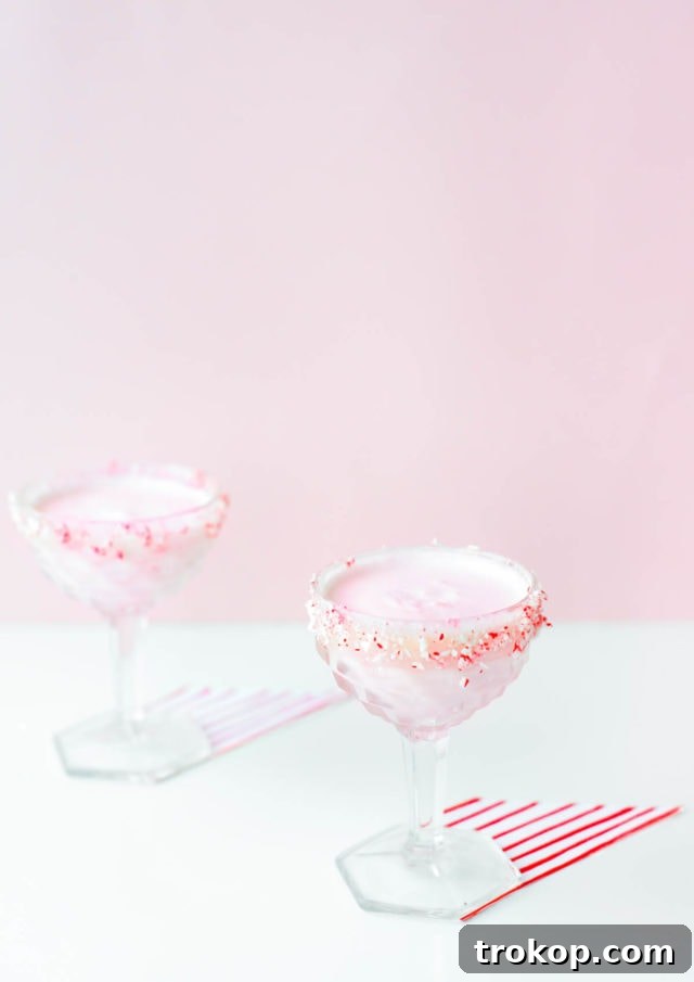 White Chocolate Candy Cane Cocktail recipe by Sugar & Cloth, an award winning DIY, recipe, and lifestyle blog.