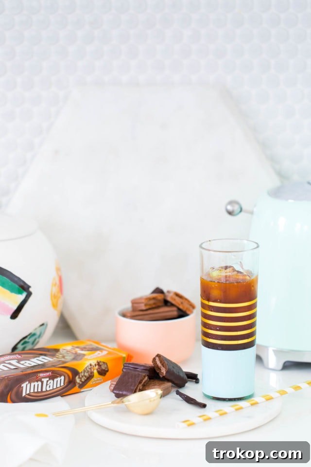 A Vanilla Bean Sparkling Iced Coffee Recipe with Tim Tam by top Houston lifestyle blogger, Ashley Rose of Sugar and Cloth