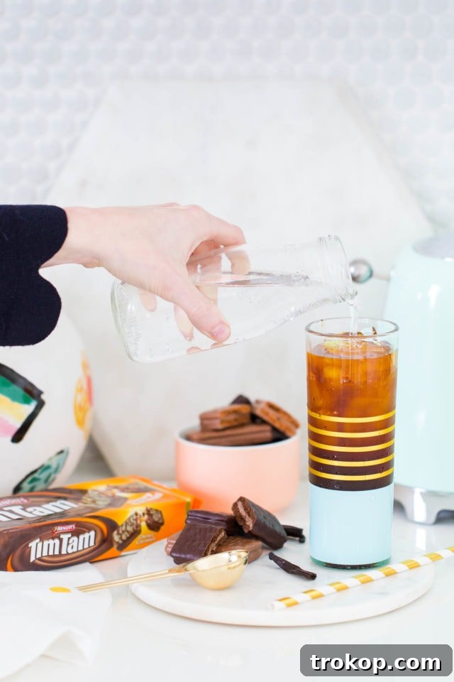 A Vanilla Bean Sparkling Iced Coffee Recipe with Tim Tam by top Houston lifestyle blogger, Ashley Rose of Sugar and Cloth