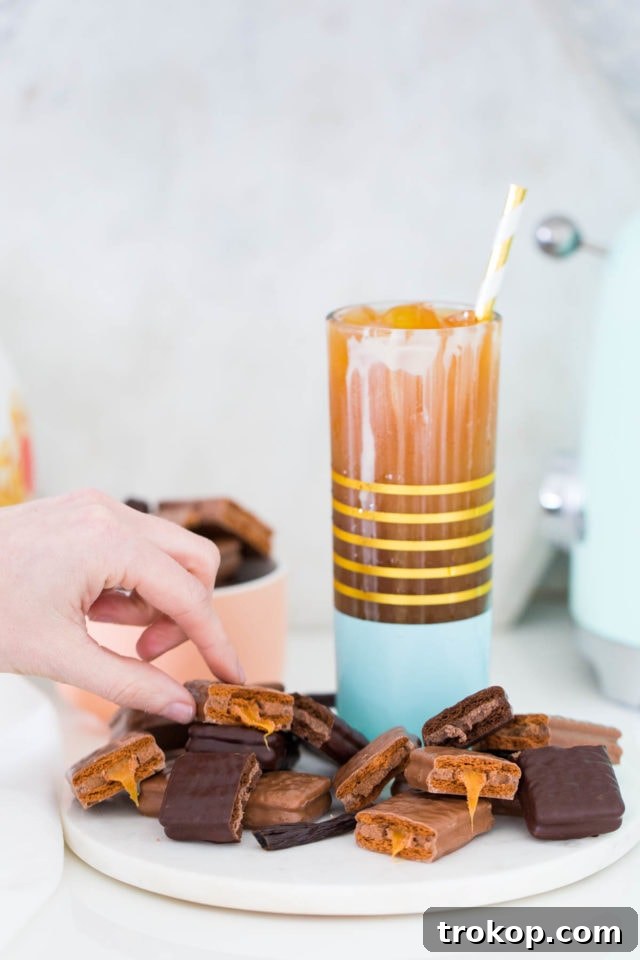A Vanilla Bean Sparkling Iced Coffee Recipe with Tim Tam by top Houston lifestyle blogger, Ashley Rose of Sugar and Cloth