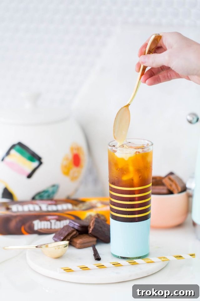 A Vanilla Bean Sparkling Iced Coffee Recipe with Tim Tam by top Houston lifestyle blogger, Ashley Rose of Sugar and Cloth