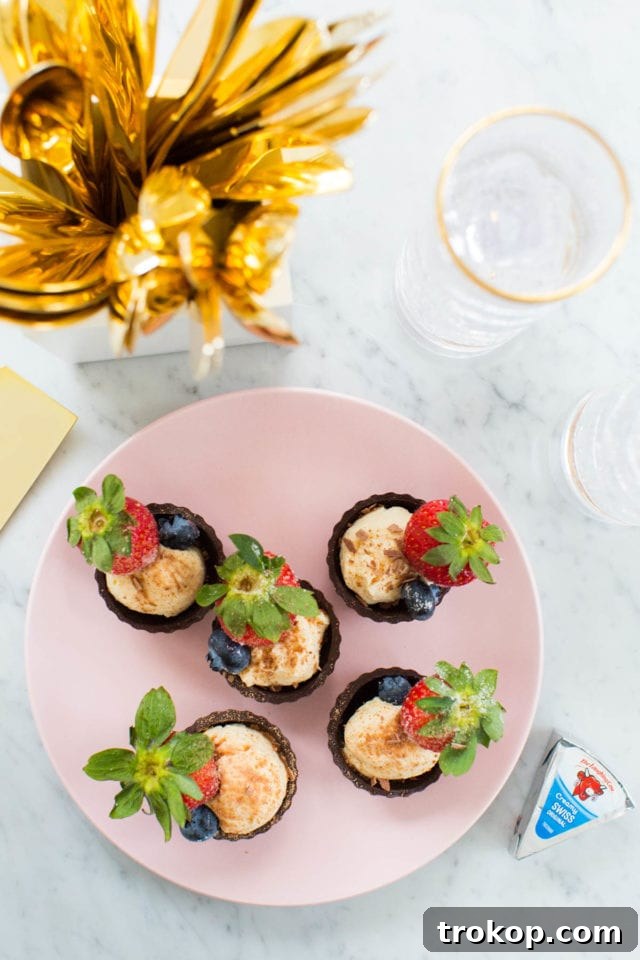 A festive arrangement of chocolate fruit cheese cups, perfect for holiday gatherings