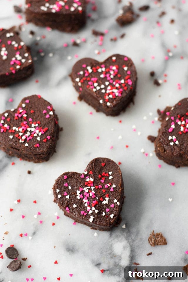 Decadent Frosted Heart-Shaped Brownies, ideal for Valentine's Day celebrations.