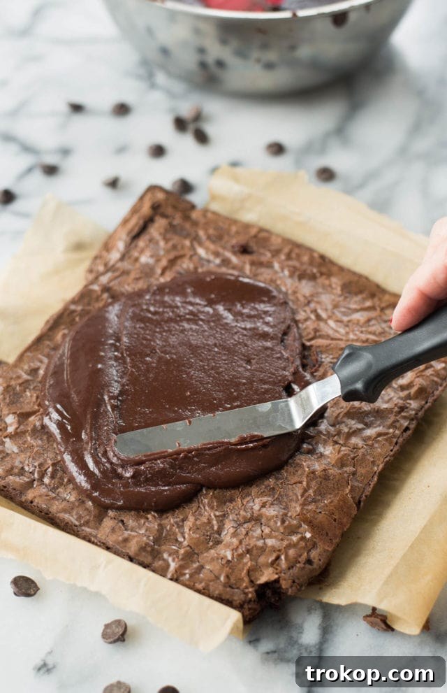 Frosted heart brownies with a variety of festive toppings.