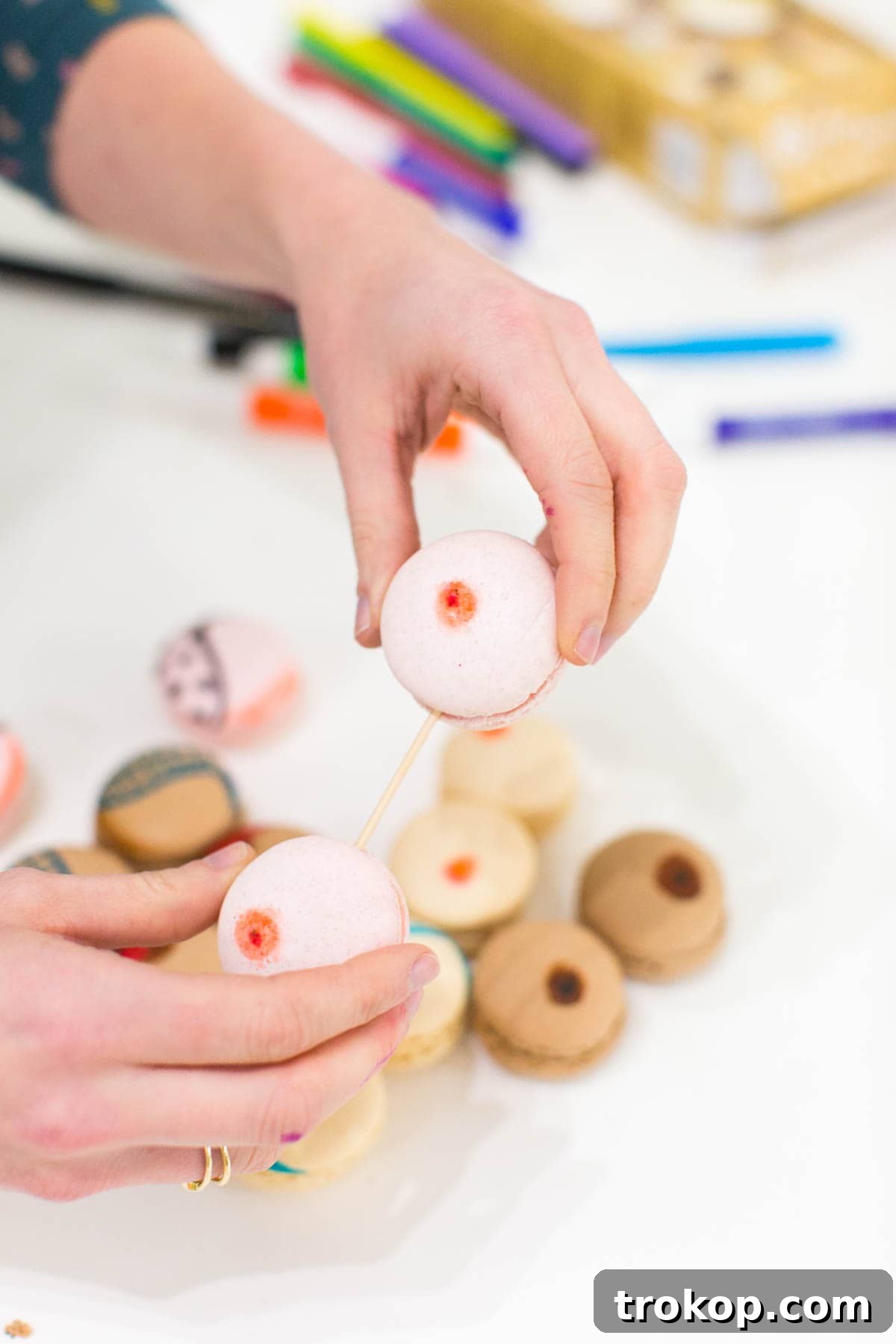 A selection of completed DIY Boob Macarons, some paired with printable Galentine's Day cards