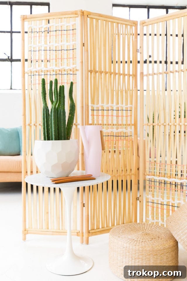 Weave Your Own Room Divider 2 Stunning DIY Woven Room Divider made from a Rattan Ikea Hack, showcasing a colorful and budget-friendly home decor solution.