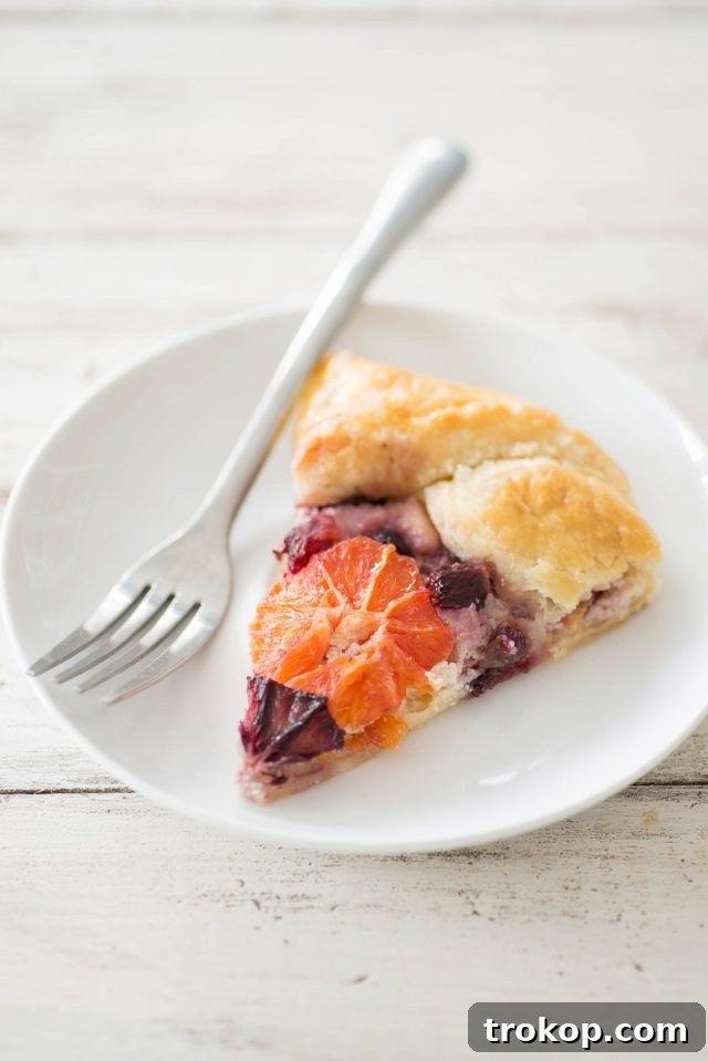 A freshly baked Citrus Galette with caramelized oranges and a golden crust.