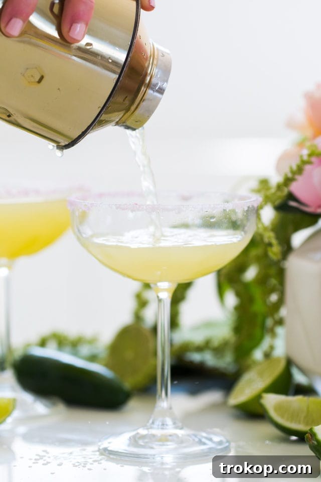Close-up of a Skinny Jalapeno Margarita, highlighting the fresh ingredients