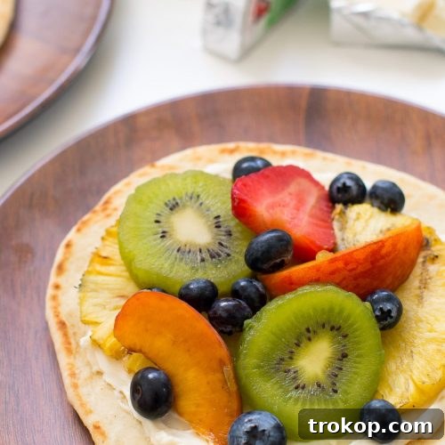 A Summer Grilled Fruit Pizza Recipe by top Houston lifestyle blogger Ashley Rose of Sugar & Cloth