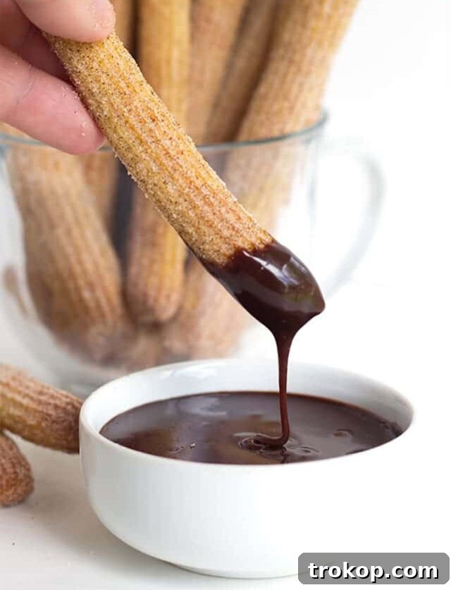 A batch of baked churros, a lighter alternative to traditional fried churros.