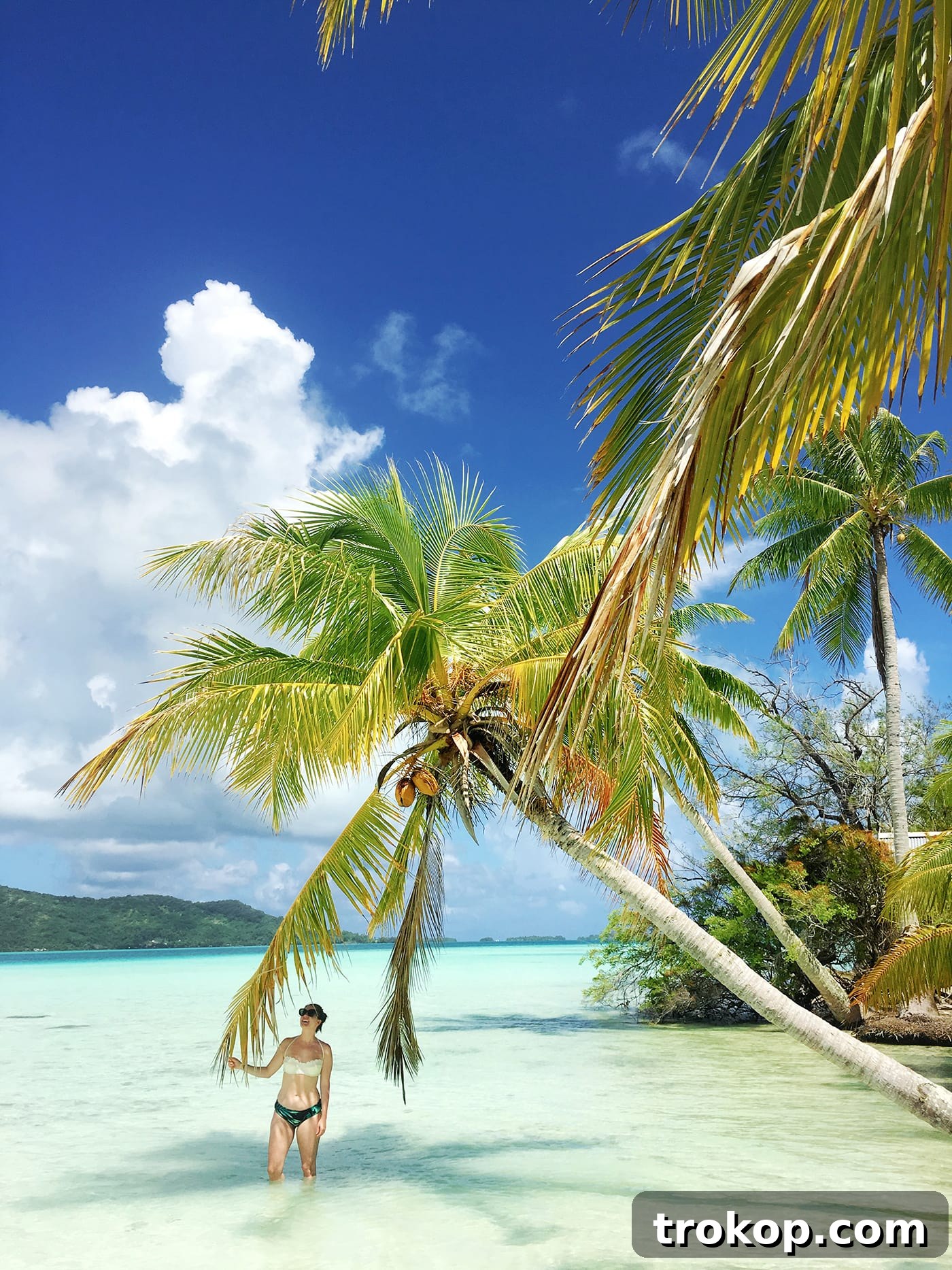 Couple on a jet ski admiring the scenic beauty of Bora Bora lagoon