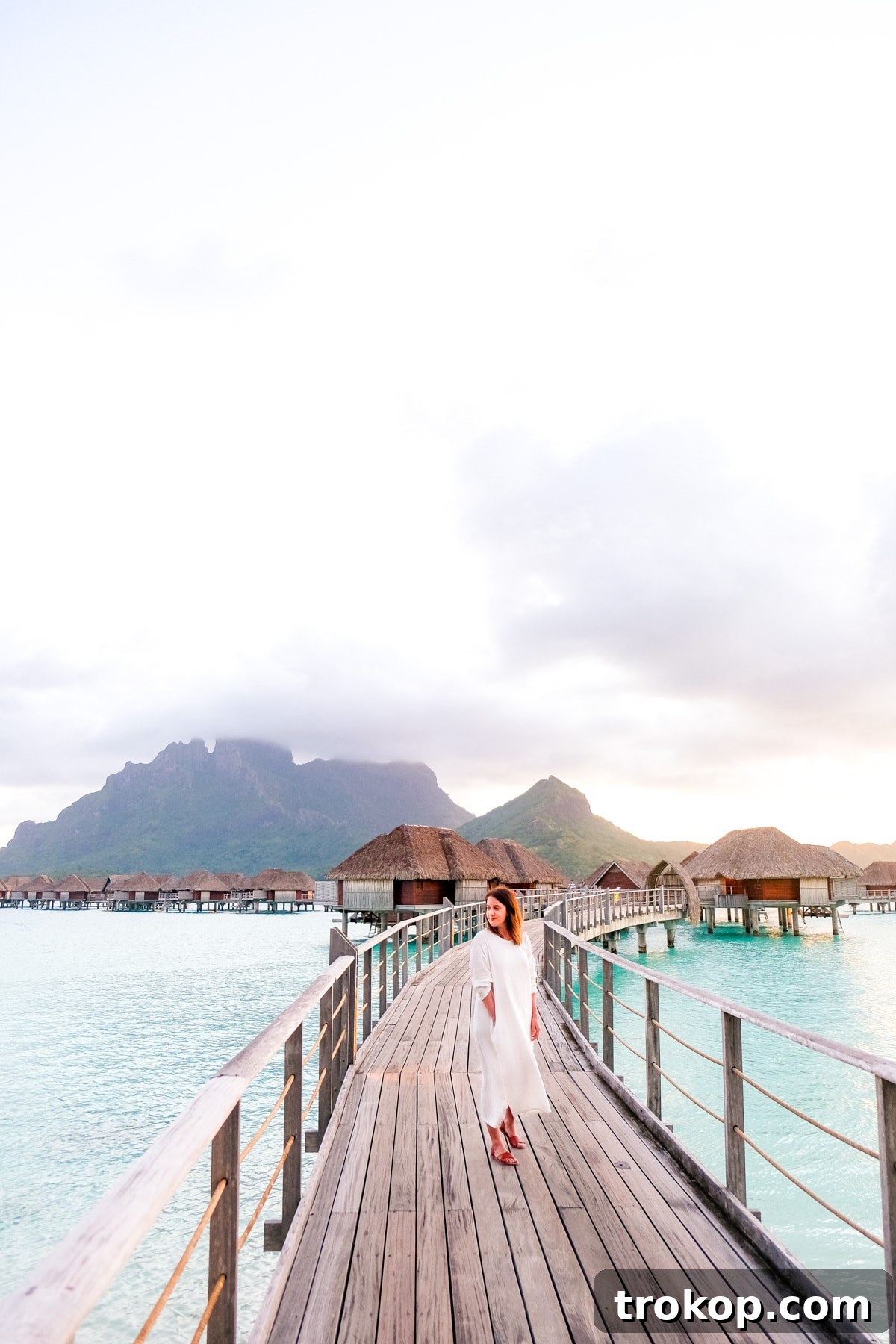 Happy couple enjoying the sun and stunning lagoon views