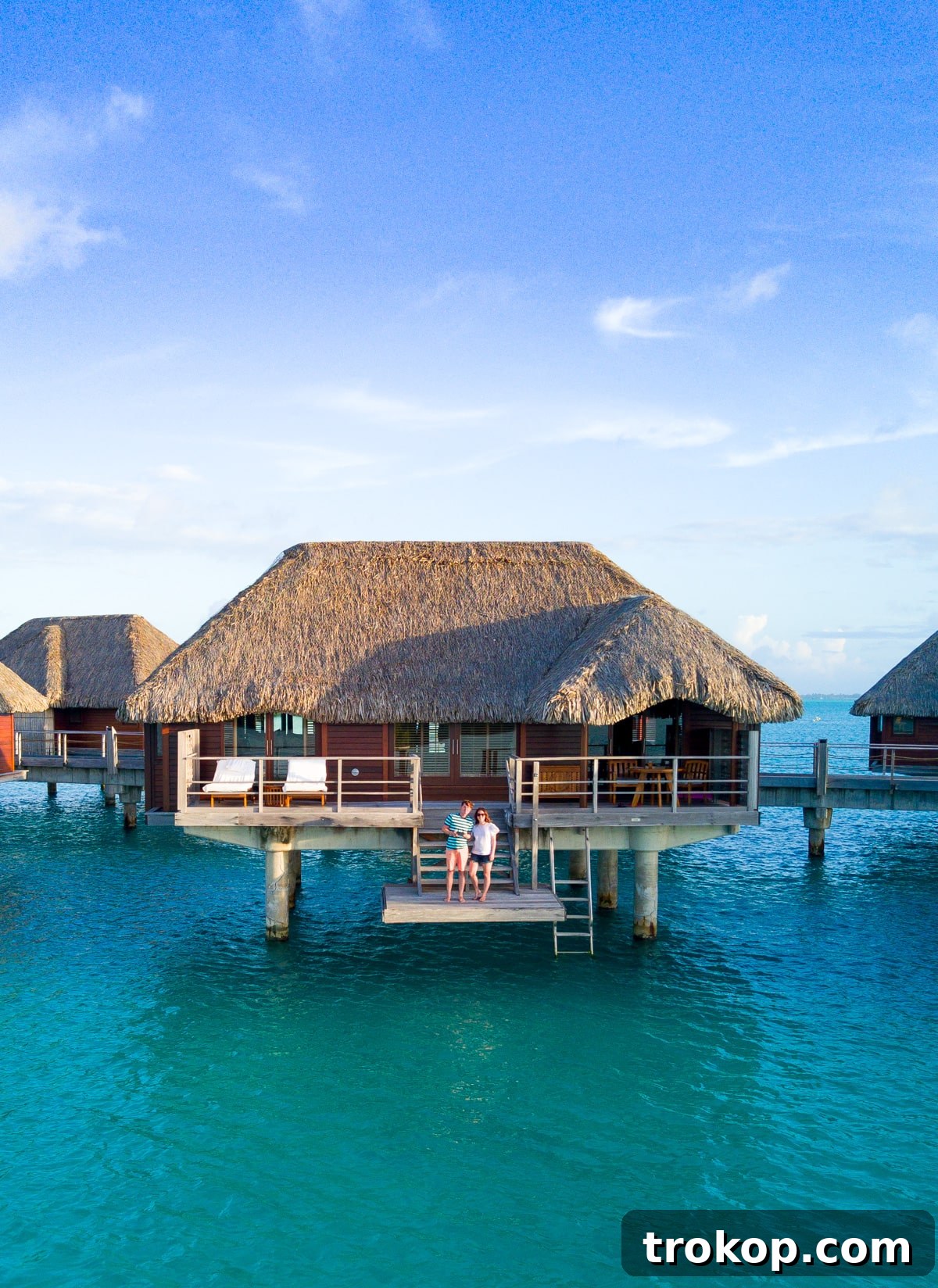 Romantic sunset view over the Four Seasons Bora Bora resort