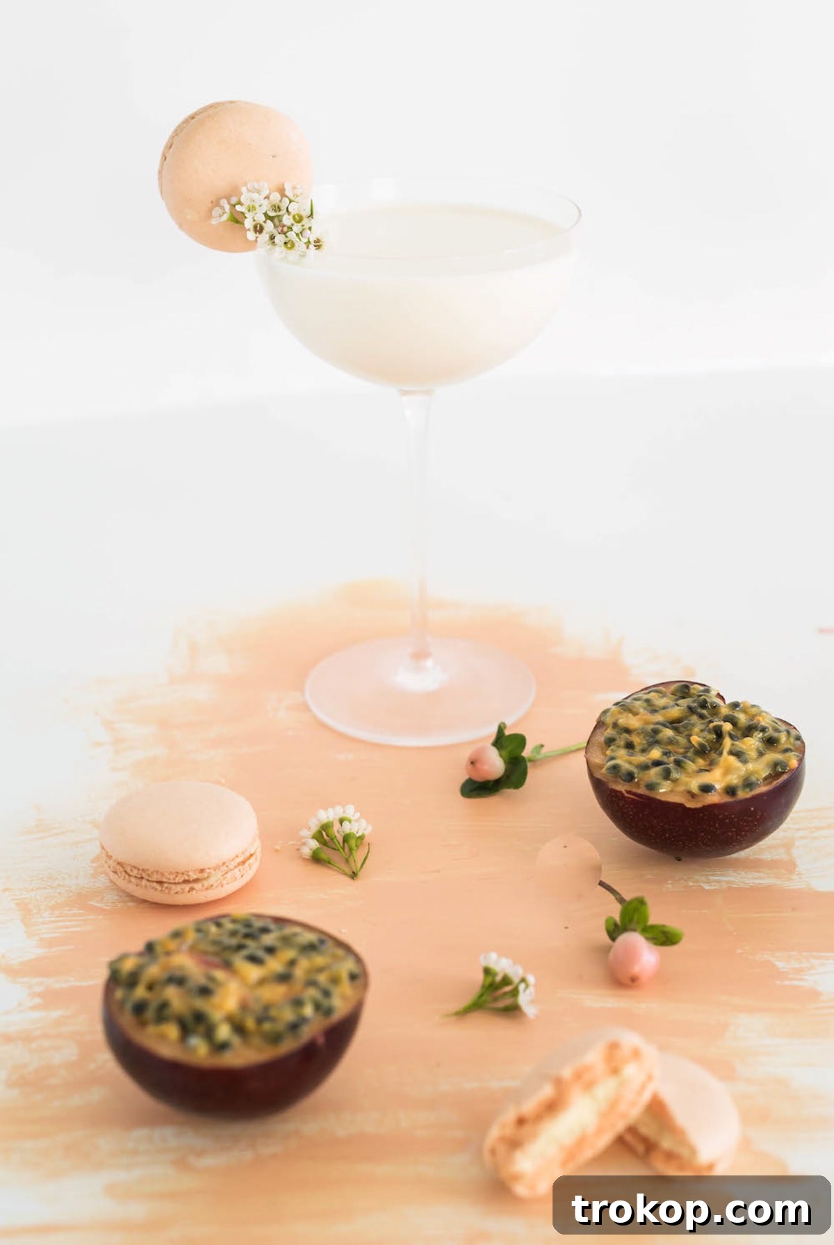 A selection of colorful macaron cocktails, beautifully presented for a delightful happy hour.