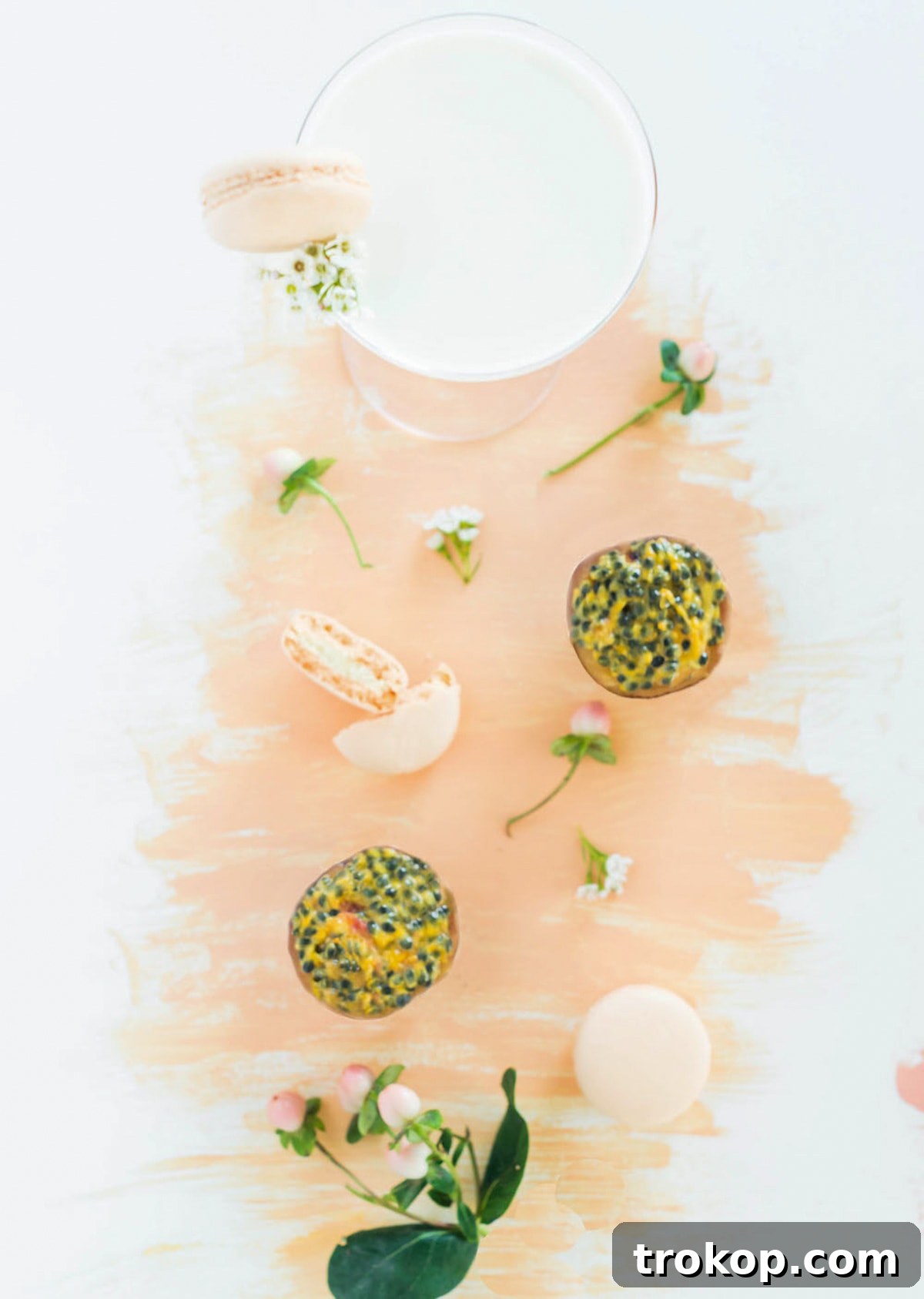 Preparing the macaron cocktail, highlighting the shaking process.