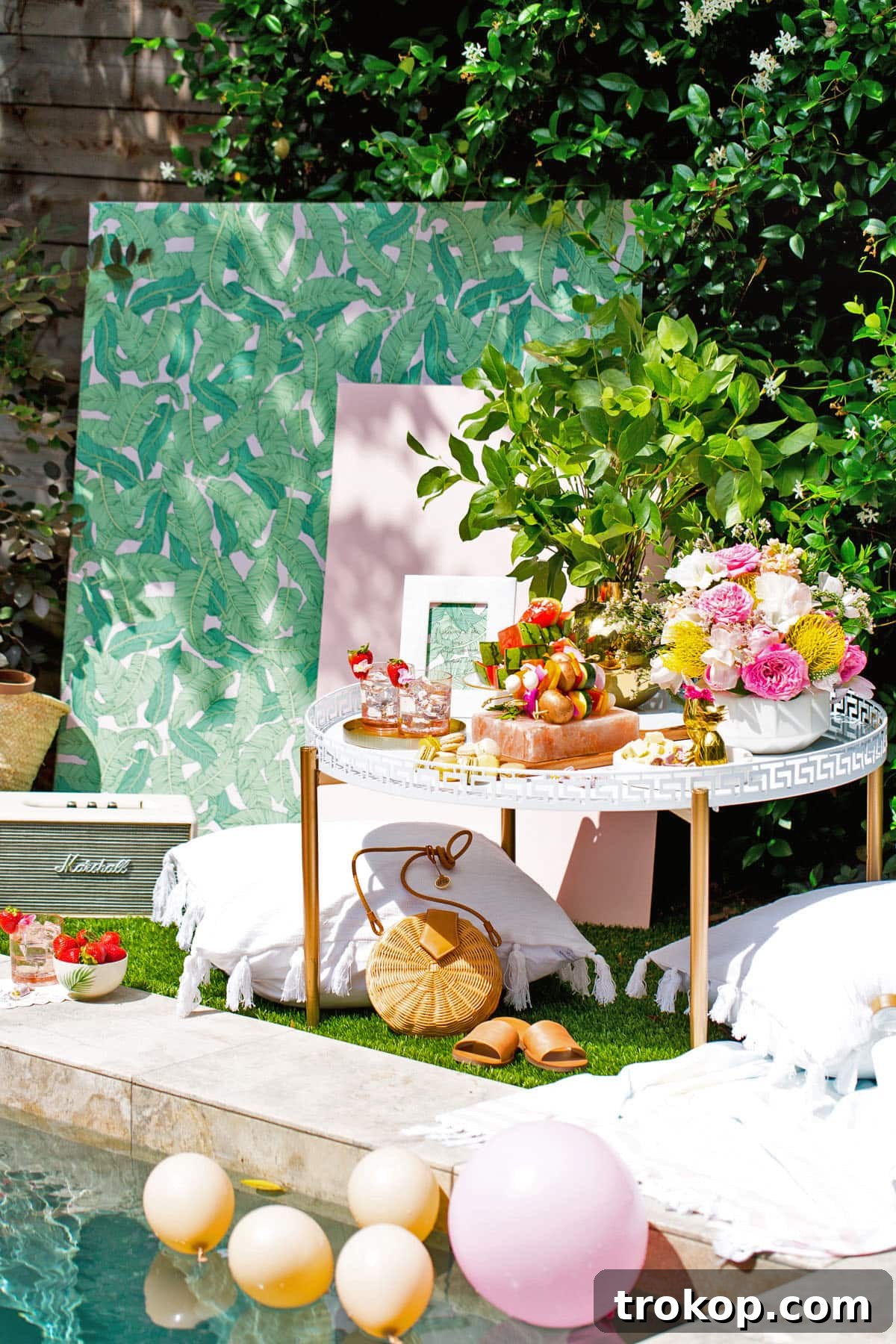 Opulent Poolside Soirees 4 Elegant poolside setting with carefully curated home decor items.